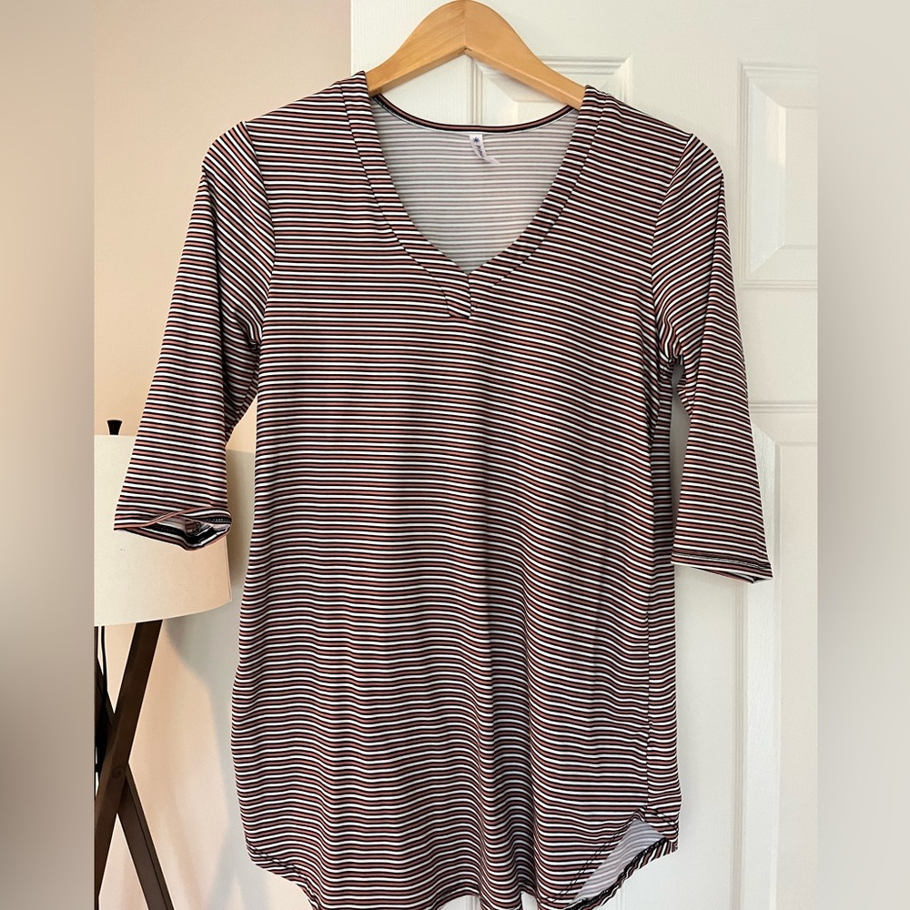 Piphany women’s athleisure style tunic top. Size Small. Stretchy and soft!